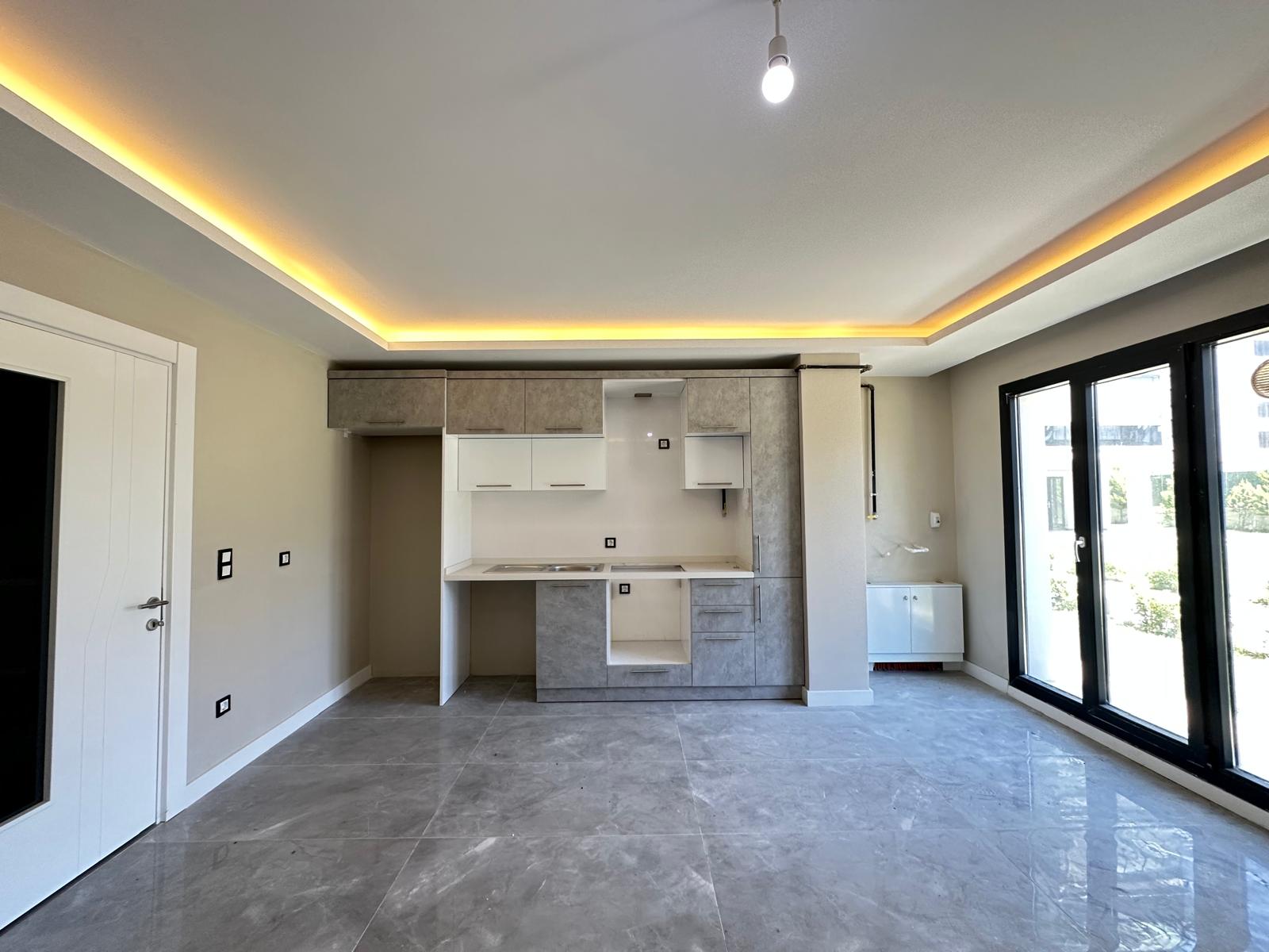 İNFİNİTY LİVİNG SİTESİ AMERİKAN MUTFAKLI BAHÇE KATI 2+1 DAİRE - VAR Gayrimenkul